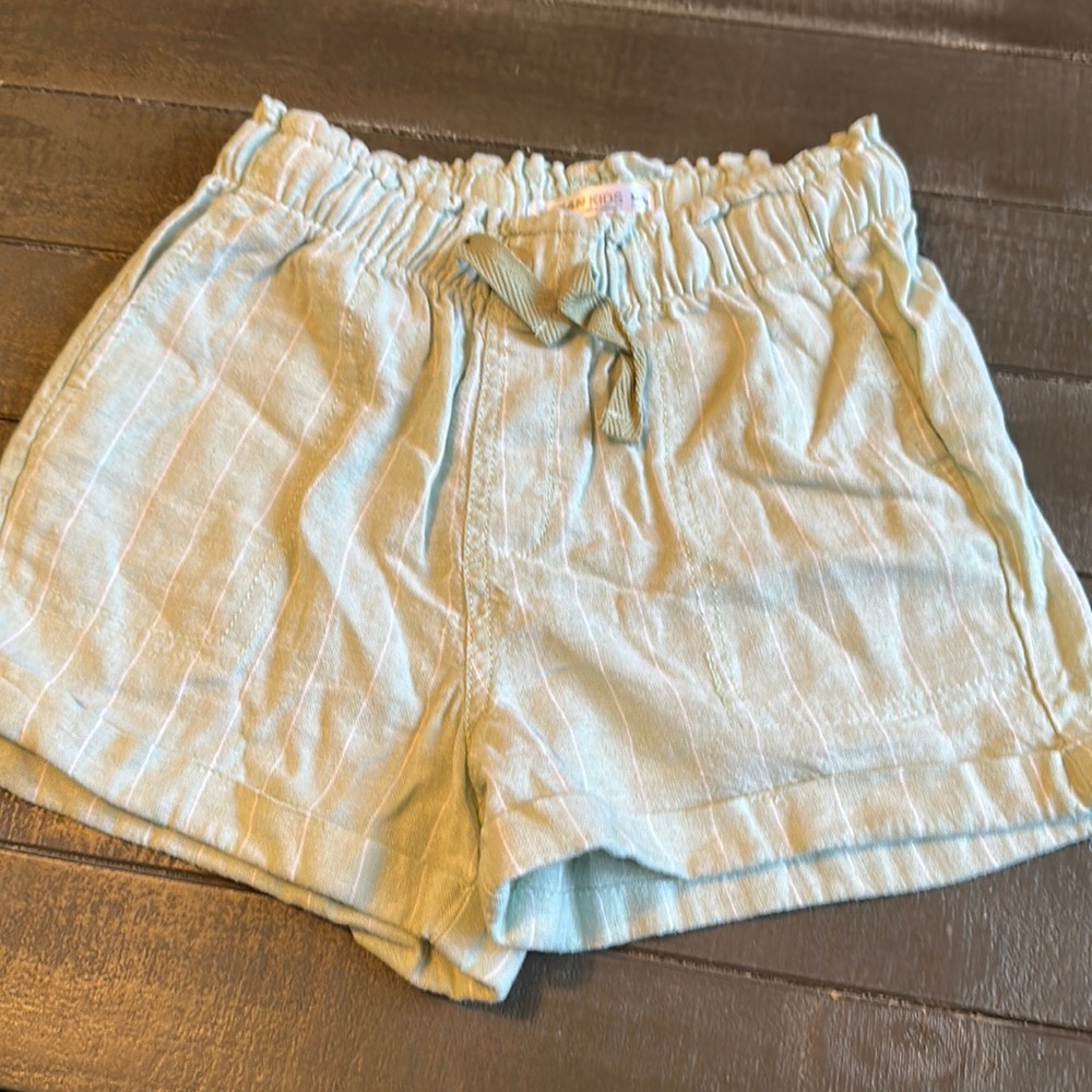 Urban kids size medium mint green with white stripes never been worn